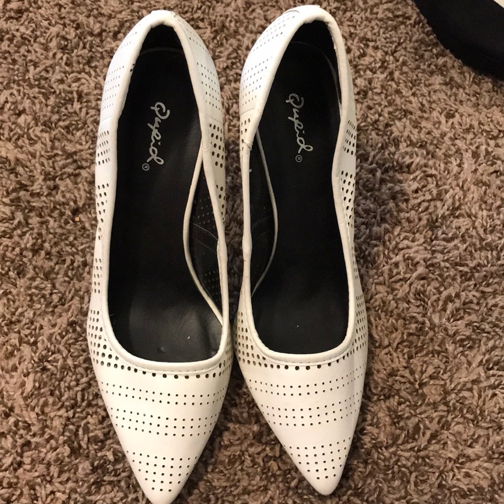 White pointed heels